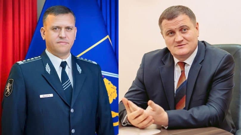 Mașină de poliție parcată în fața unei clădiri instituționale